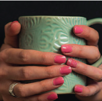 hands holding a coffee mug