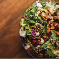 a salad on a wooden table