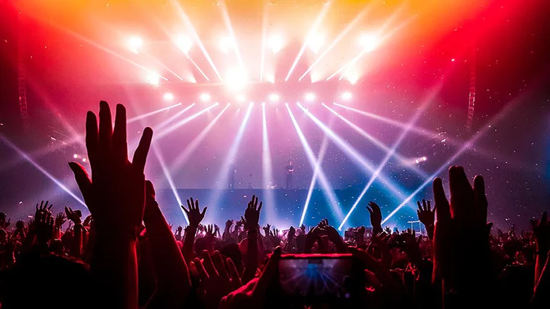 a rave waving on a performer