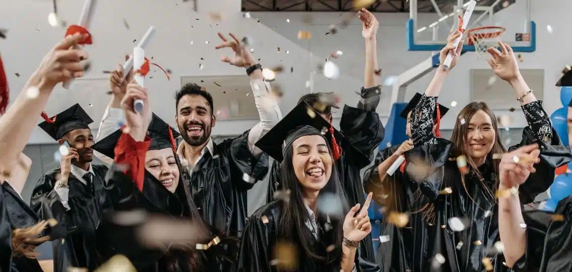 people celebrating a school graduation