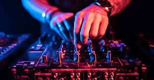 someone using a disk jockey set