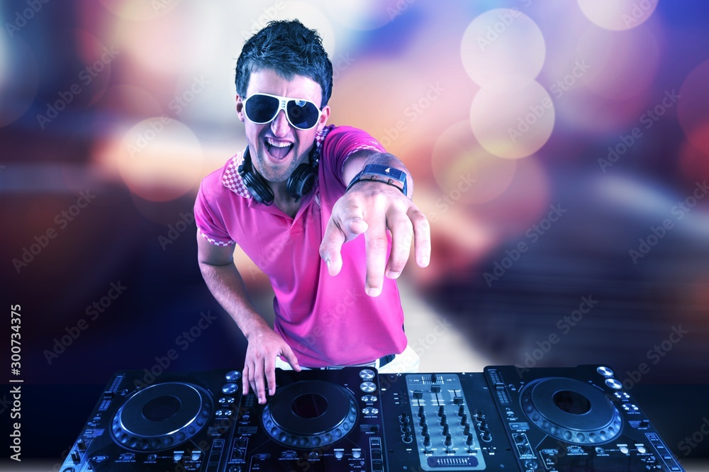 a disk jockey performing to the camera